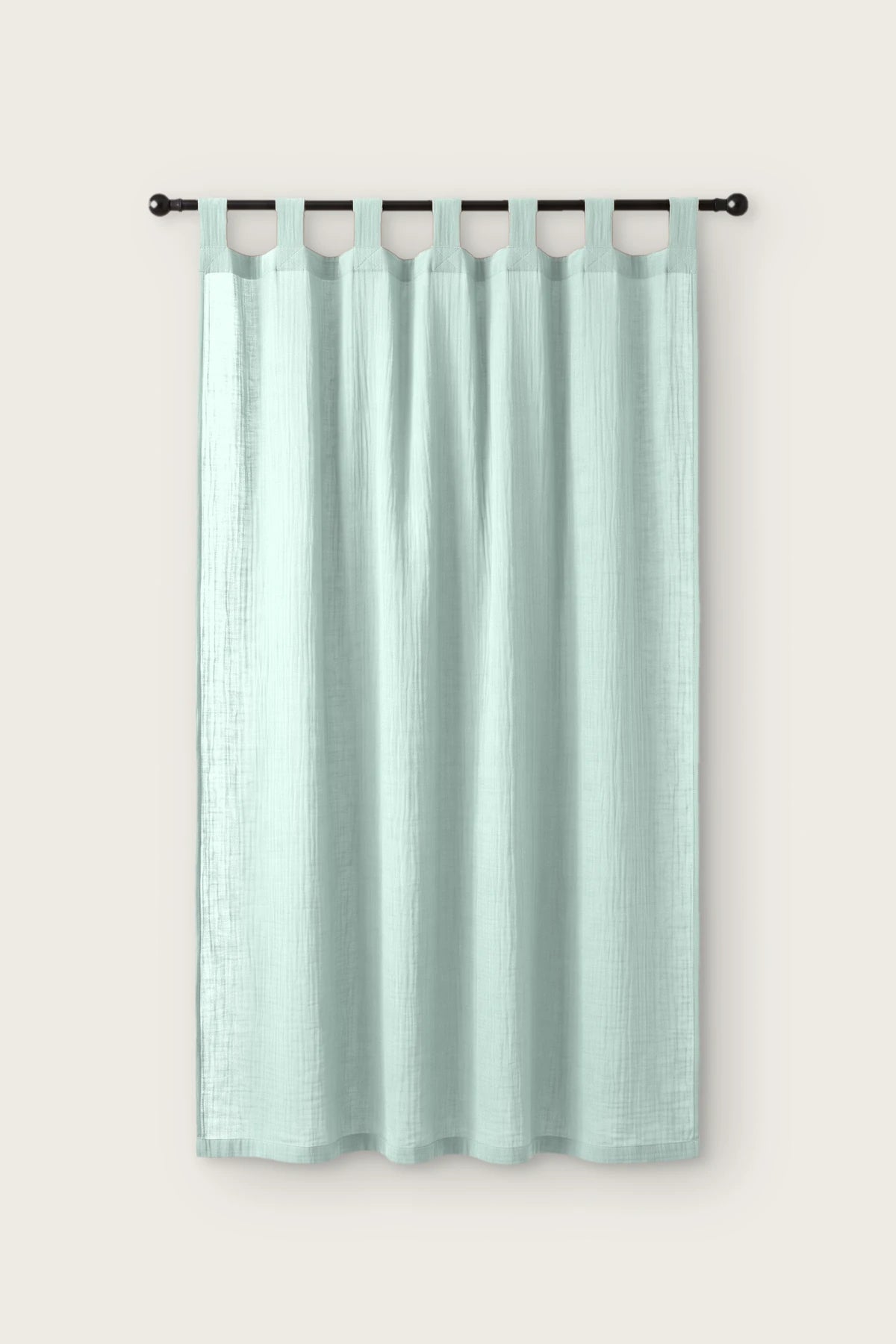 2-layer muslin cotton curtain panel in mint, single tab top panel on a black rod, front view