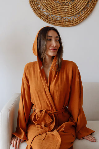 Natural hooded muslin bathrobe showing generous hood and lightweight weave by Vivamaison