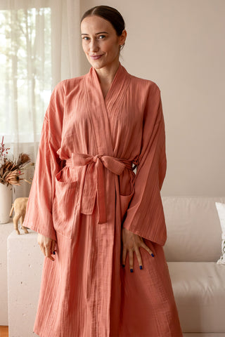 Terracotta muslin bathrobe showing lightweight double-layer gauze weave by Vivamaison