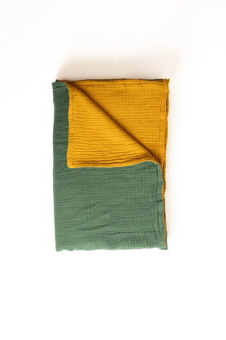 Sage Green Mustard reversible double-sided 8-layer muslin bedspread folded flat lay. Handwoven Denizli, OEKO-TEX. Vivamaison.