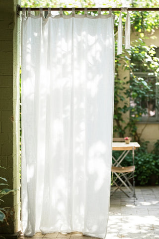 White tab top panel, garden patio backdrop. Handwoven 2-layer muslin cotton curtain, Denizli, OEKO-TEX. Vivamaison.