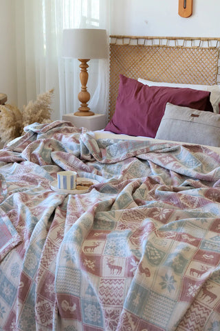 Christmas handwoven 3-layer patterned muslin Turkish cotton bedspread folded flat lay. Woven patterns, Denizli, OEKO-TEX. Viv
