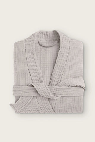 Handwoven 4-layer muslin kimono bathrobe in light beige, folded front view with wrapped belt