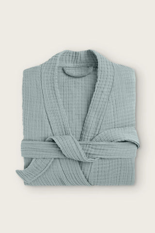 Handwoven 4-layer muslin kimono bathrobe in sage green, folded front view with wrapped belt