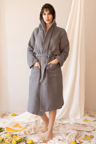 Grey handwoven 4-layer muslin hooded Turkish cotton bathrobe front standing. Denizli, OEKO-TEX. Vivamaison.