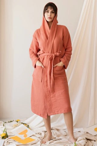 Terracotta handwoven 4-layer muslin hooded Turkish cotton bathrobe hood standing. Denizli, OEKO-TEX. Vivamaison.