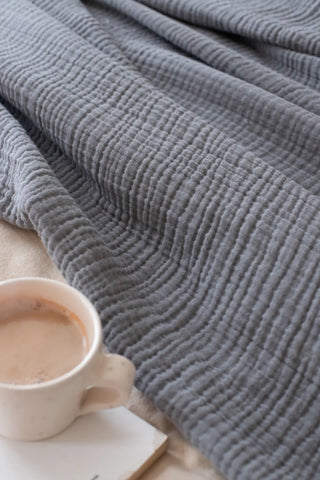 Anthracite handwoven 4-layer muslin Turkish cotton bedspread styled bedroom. Long-staple Denizli, OEKO-TEX. Vivamaison.