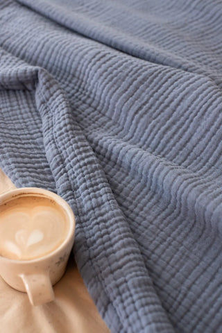 Indigo Blue handwoven 4-layer muslin Turkish cotton bedspread lifestyle. Long-staple Denizli, OEKO-TEX. Vivamaison.