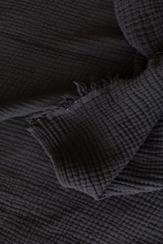 Black handwoven 4-layer soft muslin fringed bedspread fringe detail. Tasseled edges, Denizli, OEKO-TEX. Vivamaison.