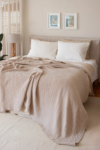 Brown handwoven 4-layer soft muslin fringed bedspread styled bedroom. Tasseled edges, Denizli, OEKO-TEX. Vivamaison.