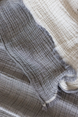 Grey handwoven 4-layer soft muslin fringed bedspread front full. Tasseled edges, Denizli, OEKO-TEX. Vivamaison.