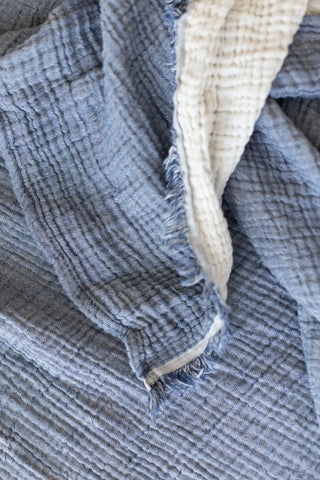 Indigo Blue handwoven 4-layer soft muslin fringed bedspread fringe detail. Tasseled edges, Denizli, OEKO-TEX. Vivamaison.