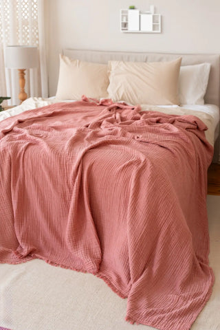 Terracotta handwoven 4-layer soft muslin fringed bedspread edge detail. Tasseled edges, Denizli, OEKO-TEX. Vivamaison.