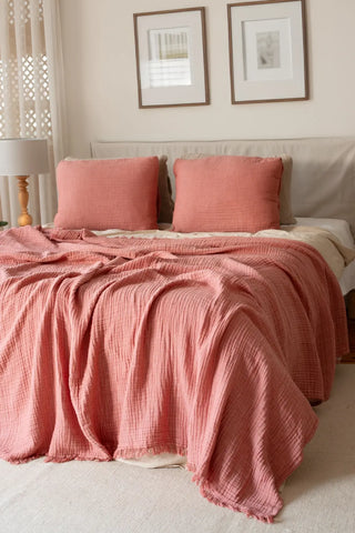 Terracotta handwoven 4-layer soft muslin fringed bedspread styled bedroom. Tasseled edges, Denizli, OEKO-TEX. Vivamaison.