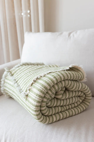 Green Striped handwoven 8-layer muslin Turkish cotton quilt alternate view. Hand-tied fringe Denizli, OEKO-TEX. Vivamaison.