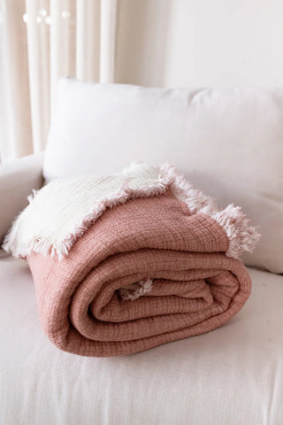 Terracotta handwoven 8-layer muslin Turkish cotton quilt styled bed. Hand-tied fringe Denizli, OEKO-TEX. Vivamaison.