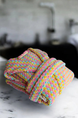 Mint pink chickpea bathrobe folded flat lay. Handwoven Turkish cotton Denizli, OEKO-TEX. Vivamaison.