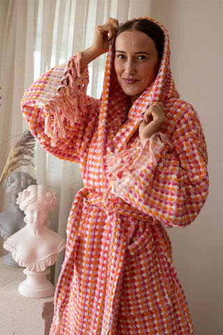 Pink orange chickpea bathrobe hood up front closeup. Handwoven Turkish cotton Denizli, OEKO-TEX. Vivamaison.
