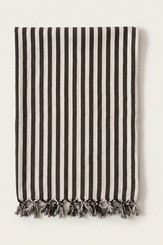 Classic striped Turkish cotton peshtemal towel in black, folded front view with knotted fringe