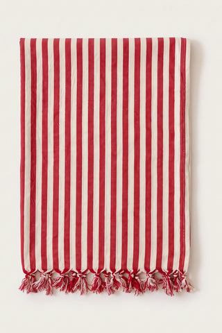 Classic striped Turkish cotton peshtemal towel in red, folded front view with knotted fringe