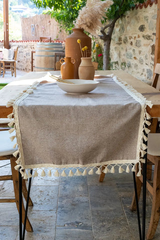 Brown handwoven Turkish cotton tassel table runner detail. Hand-tied tassels Denizli, OEKO-TEX. Vivamaison.