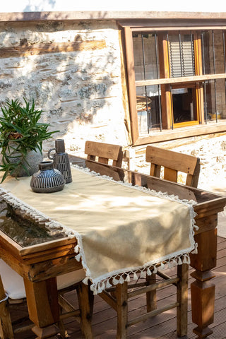 Yellow handwoven Turkish cotton tassel table runner lifestyle. Hand-tied tassels Denizli, OEKO-TEX. Vivamaison.