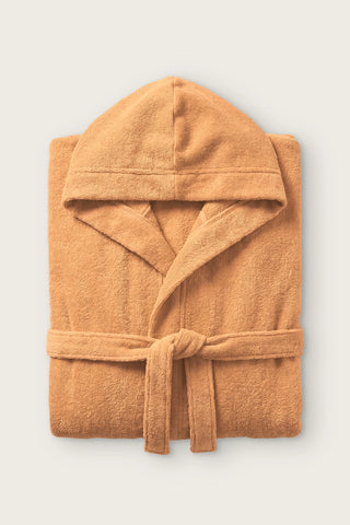 Handwoven Turkish cotton terry hooded bathrobe in earth, folded front view with hood and tied belt