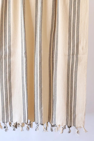 Black elegant striped peshtemal towel fringe detail closeup. Handwoven Turkish cotton Denizli, OEKO-TEX. Vivamaison.