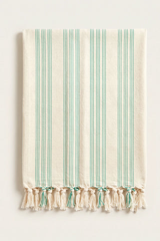 Elegant striped Turkish cotton peshtemal towel in green, folded front view with grouped stripes and knotted fringe