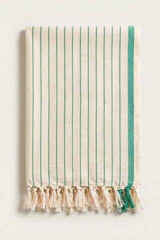 Luxury striped Turkish cotton peshtemal towel in green, folded front view with side band and knotted fringe