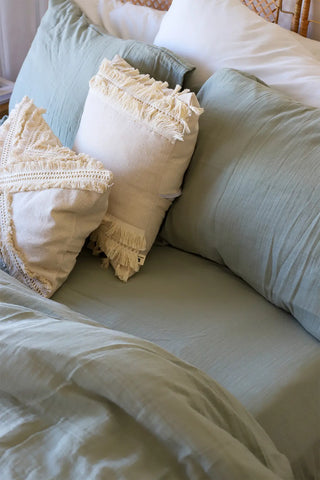 Sage Green handwoven soft muslin Turkish cotton plain duvet cover folded flat lay. Long-staple Denizli, OEKO-TEX. Vivamaison.