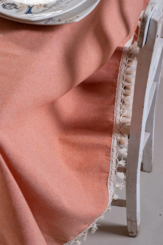 Orange handwoven solid color Turkish cotton tassel tablecloth lifestyle. Tasseled edges Denizli, OEKO-TEX. Vivamaison.