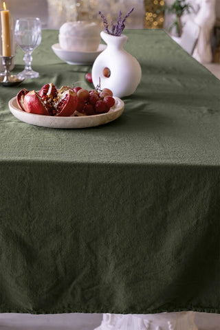 Green handwoven stonewashed Turkish cotton tablecloth detail. Vintage-soft Denizli, OEKO-TEX. Vivamaison.