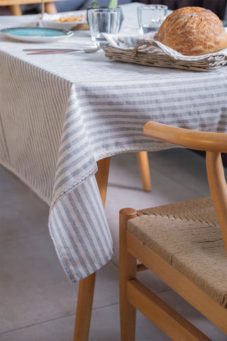 Grey handwoven striped linen lace cotton tablecloth close up. Crocheted lace Denizli, OEKO-TEX. Vivamaison.
