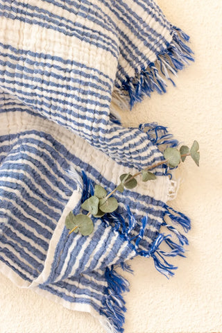 Blue striped peshtemal towel fringe detail closeup. Handwoven Turkish cotton Denizli, OEKO-TEX. Vivamaison.