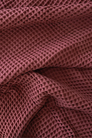 Burgundy handwoven Turkish cotton waffle weave bedspread lifestyle. 350 GSM Denizli, OEKO-TEX. Vivamaison.