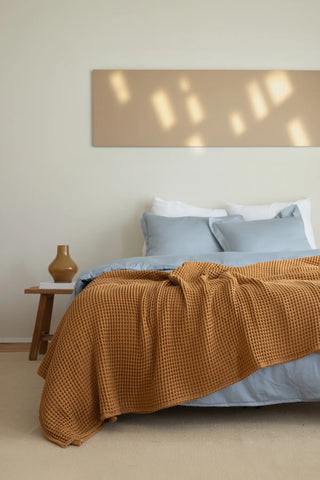 Caramel handwoven Turkish cotton waffle weave bedspread detail. 350 GSM Denizli, OEKO-TEX. Vivamaison.