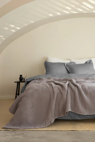 Grey handwoven Turkish cotton waffle weave bedspread detail. 350 GSM Denizli, OEKO-TEX. Vivamaison.