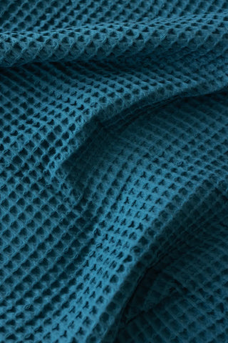 Indigo Blue handwoven Turkish cotton waffle weave bedspread folded flat lay. 350 GSM Denizli, OEKO-TEX. Vivamaison.