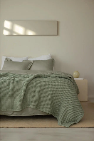Sage Green handwoven Turkish cotton waffle weave bedspread detail. 350 GSM Denizli, OEKO-TEX. Vivamaison.
