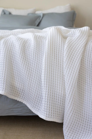 White handwoven Turkish cotton waffle weave bedspread detail. 350 GSM Denizli, OEKO-TEX. Vivamaison.