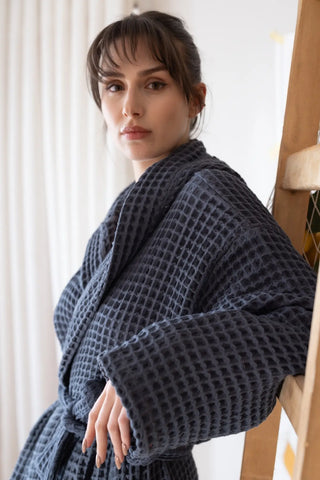 Anthracite waffle weave texture closeup, handwoven hooded bathrobe. Turkish cotton Denizli, OEKO-TEX. Vivamaison.