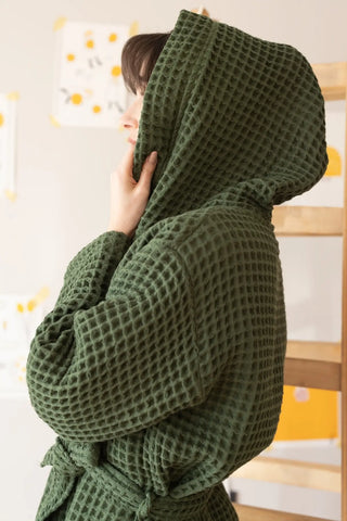Dark green waffle hooded bathrobe hood up side profile. Handwoven Turkish cotton Denizli, OEKO-TEX. Vivamaison.