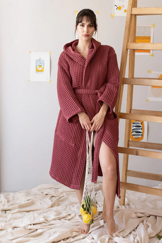 Dark red waffle hooded bathrobe front full view, spa lifestyle. Handwoven Turkish cotton Denizli, OEKO-TEX. Vivamaison.