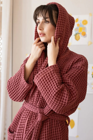 Dark red waffle hooded bathrobe hood up side closeup. Handwoven Turkish cotton Denizli, OEKO-TEX. Vivamaison.