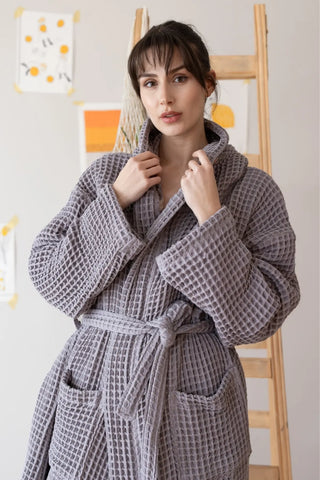 Handwoven waffle hooded bathrobe in grey, front closeup. Turkish cotton from Denizli, OEKO-TEX. Vivamaison.