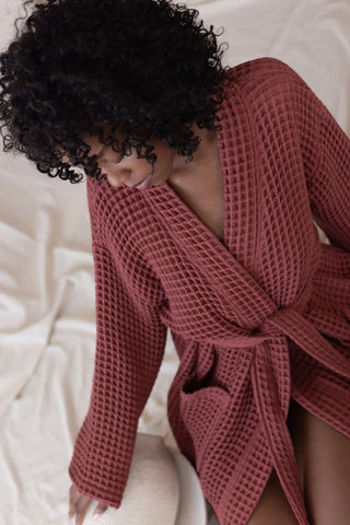 Dark Red handwoven Turkish cotton waffle kimono bathrobe close up. Denizli, OEKO-TEX. Vivamaison.