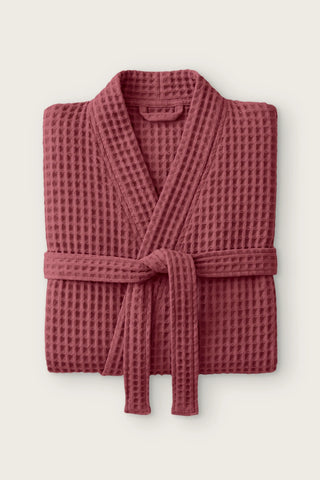 Handwoven waffle kimono bathrobe in dark red, folded front view with tied belt