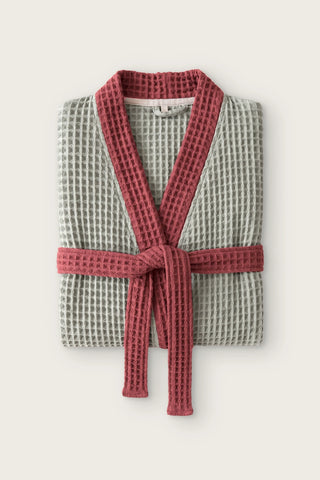 Handwoven two-tone waffle kimono bathrobe in sage green - burgundy, folded front view with contrast collar and tied belt