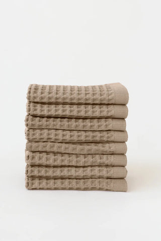 Brown handwoven Turkish cotton waffle weave towel set of 8 washcloths stacked. Denizli, OEKO-TEX. Vivamaison.
